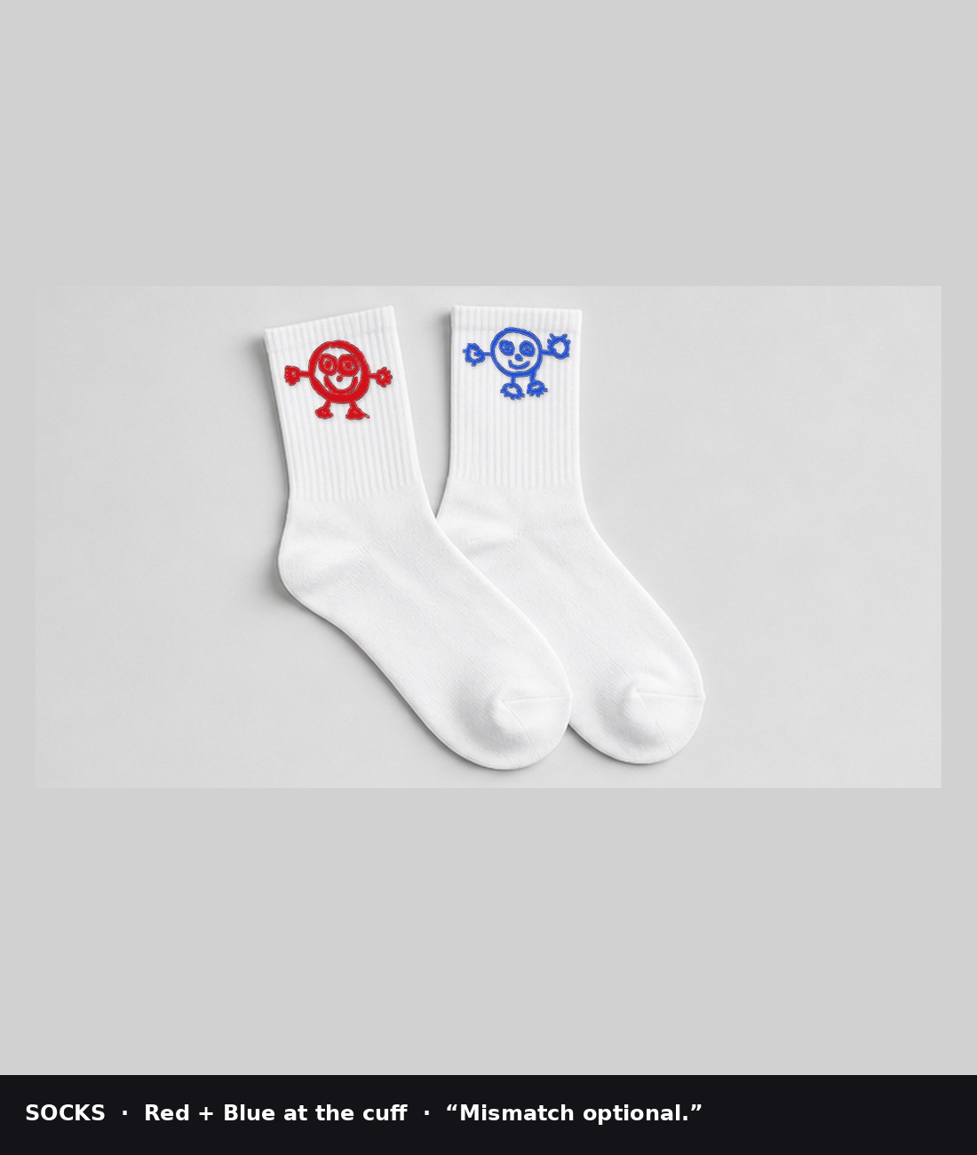 Pair of white socks with Red Boy on one cuff and Blue Boy on the other